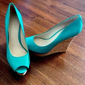 Nine West wedge heels size 9.5. Worn only a few times.